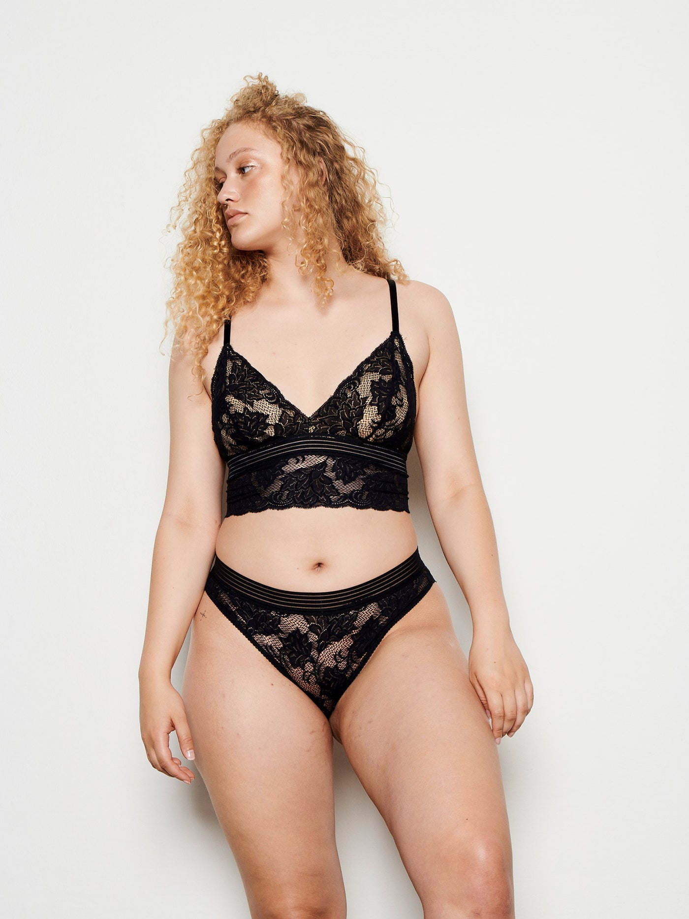 Female wearing our Gilda Briefs Black. Seen from the front. 